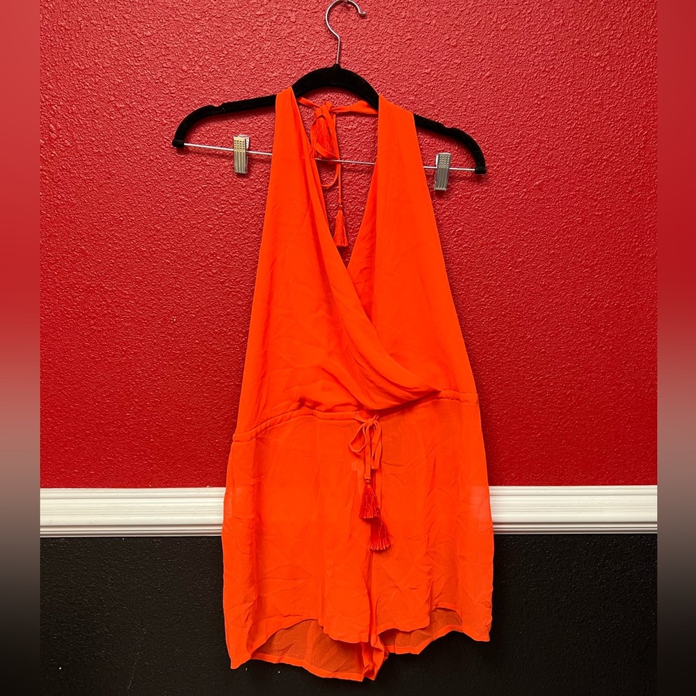 Orange rompers for a beach day see through